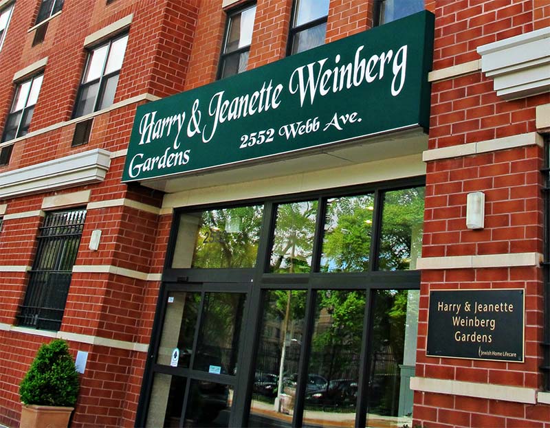 The brick exterior and sun awning of The New Jewish home Harry and Jeanette Weinberg Gardens